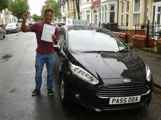Manyongy Moliro clearly delighted holding his Pass Certificate after passing his test first time today A fantastic drive in pouring rain with only 2 driver faults Really well done after struggling to fit lessons in recently Good luck with your driving in the future Enjoy biut most of all keep safe Salvina Sarah 24th May 2014