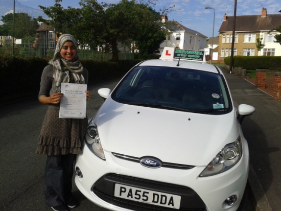 Shereen Ahmed proudly holding her pass certificate after passing first time today with a safe and confident drive with few driver faults A great result well deserved from combining driving work and studying Well done for following your sisters lead passing first time Congratulations again Good luck with your driving Keep Safe Salvina and Sarah 20th August 2013