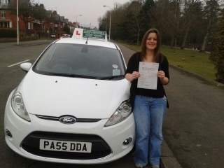 Dr Helen Bradshaw proudly holding her Pass Certificate after passing first time today A great achievement especially as due to work commitments most lessons have been in the dark Often the best drivers learn in the dark 12th February 2013