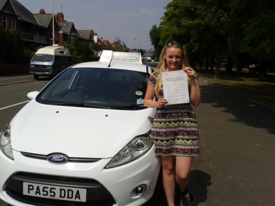 Eden Davies proudly holding her Pass Certificate after passing first time today Congratulations again and well done A great achievement after juggling work and Uni and a reward for all your perserverance Salvina is looking forward to seeing you foe Pass Plus and the good news is there is no test after it Good luck for safe driving 22nd July 2013
