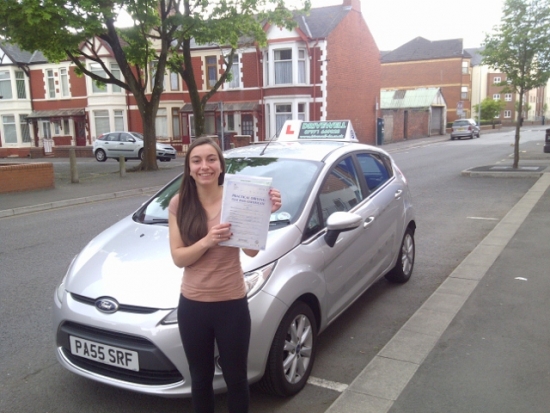 Rebekah Dale proudly holding her Pass Certificate after passing today A great result following determination a positive attitude and combining lessons with Uni work Congratulations again Enjoy driving your car in the holidays Steer clear of the sheep Good luck for safe driving Hope to see you for Motorway and night lessons in the Autumn