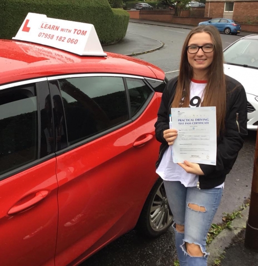 Emma learned to drive with the help of Tom McDermid.