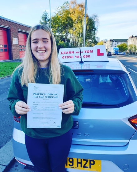 Isla learned to drive with the help of Graham Macleod