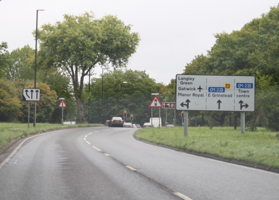 Use the road signs and marking to help you find the correct lane