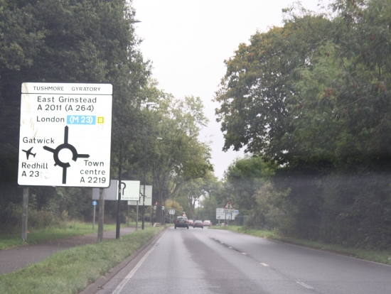 Use the sighns and road markings to help you into the correct lane