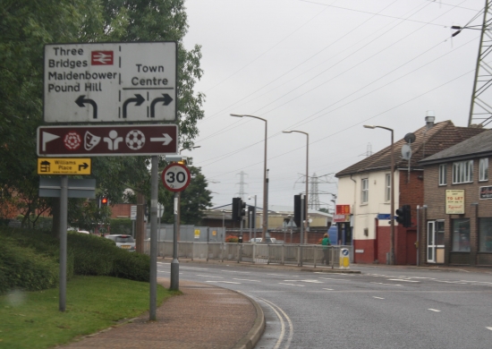 Use the signs and markings to find the correct lane