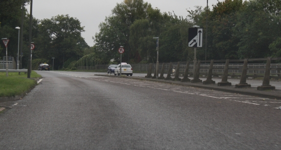 See the sign telling you to merge know where you give way line islots mirrors